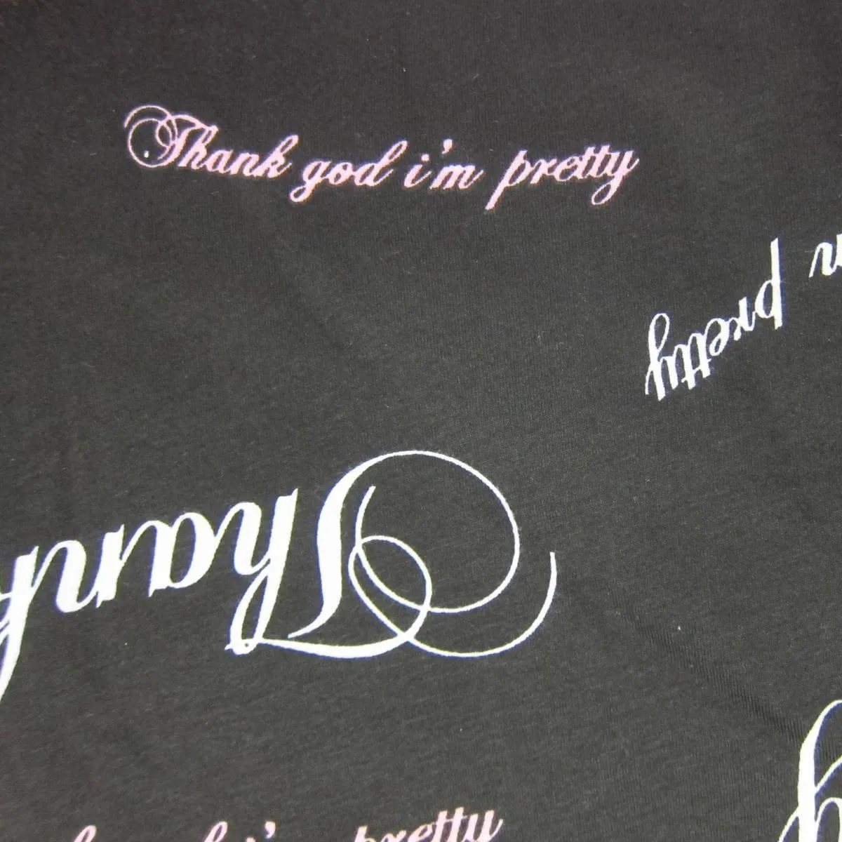 David and Goliath Thank God I'm Pretty on Black Cotton Jersey Fabric
