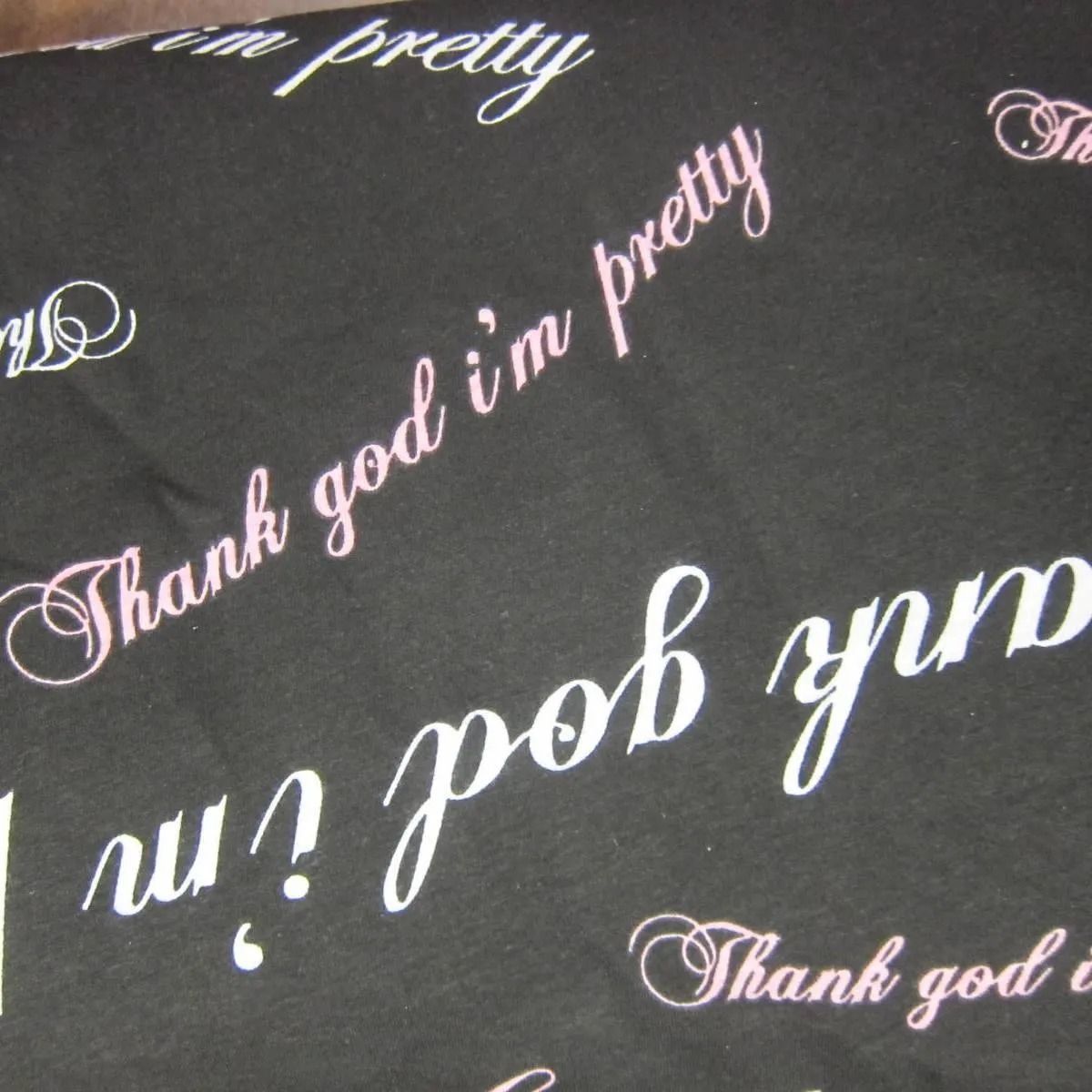 David and Goliath Thank God I'm Pretty on Black Cotton Jersey Fabric